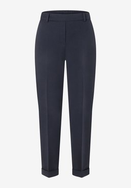 MORE & MORE Jeans: dunkelblaue Hose mit Gummizug und Krempelsaum, vorderseitig mit Falten und Reißverschluss.