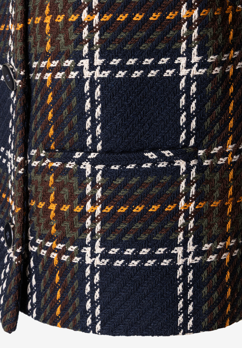 Detailansicht eines Blazers von MORE & MORE mit auffälligem Karomuster in Dunkelblau, Braun-, Grün- und Gelbtönen. Detailansicht eines Blazers von MORE & MORE mit auffälligem Karomuster in Dunkelblau, Braun-, Grün- und Gelbtönen.