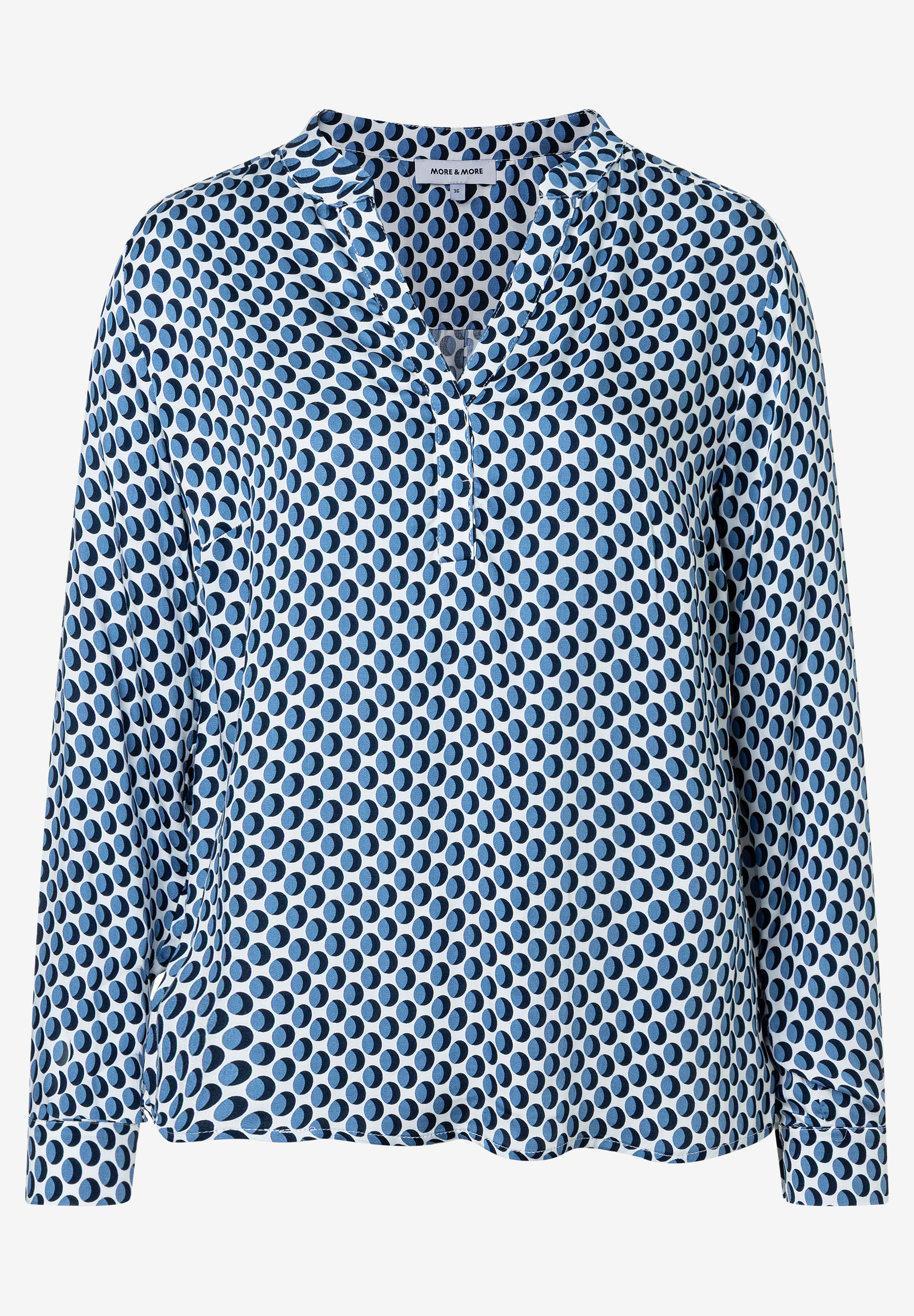 Eine MORE & MORE Bluse mit blau-weißem Punktmuster. Langärmlig und aus Viskose für kühlen Tragekomfort. Eine MORE & MORE Bluse mit blau-weißem Punktmuster. Langärmlig und aus Viskose für kühlen Tragekomfort.